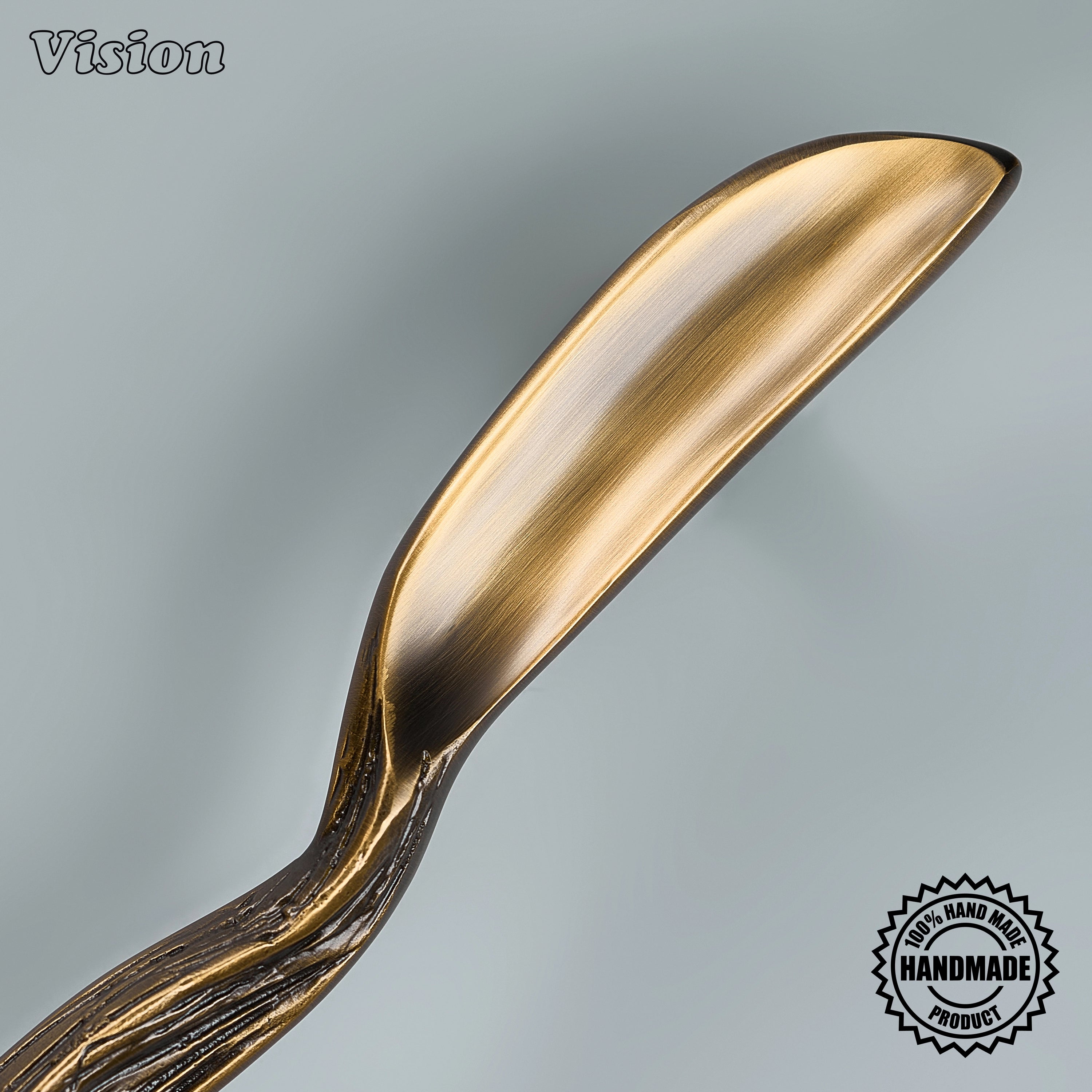 Premium antique bronze sculpted brass pull with round mounting posts on integrated dishwashers