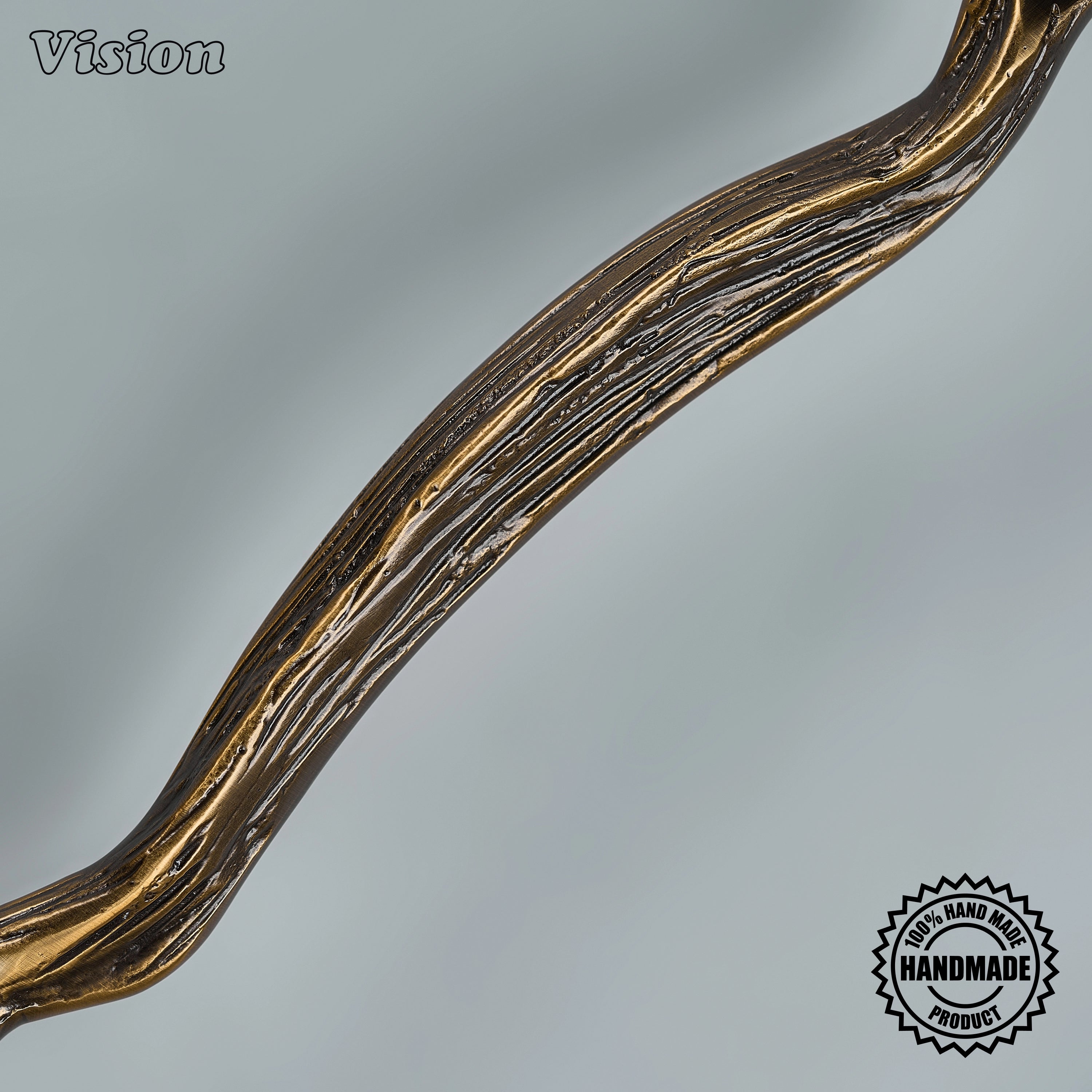 Luxury antique bronze sculpted appliance handle with round base legs on custom built-in freezers