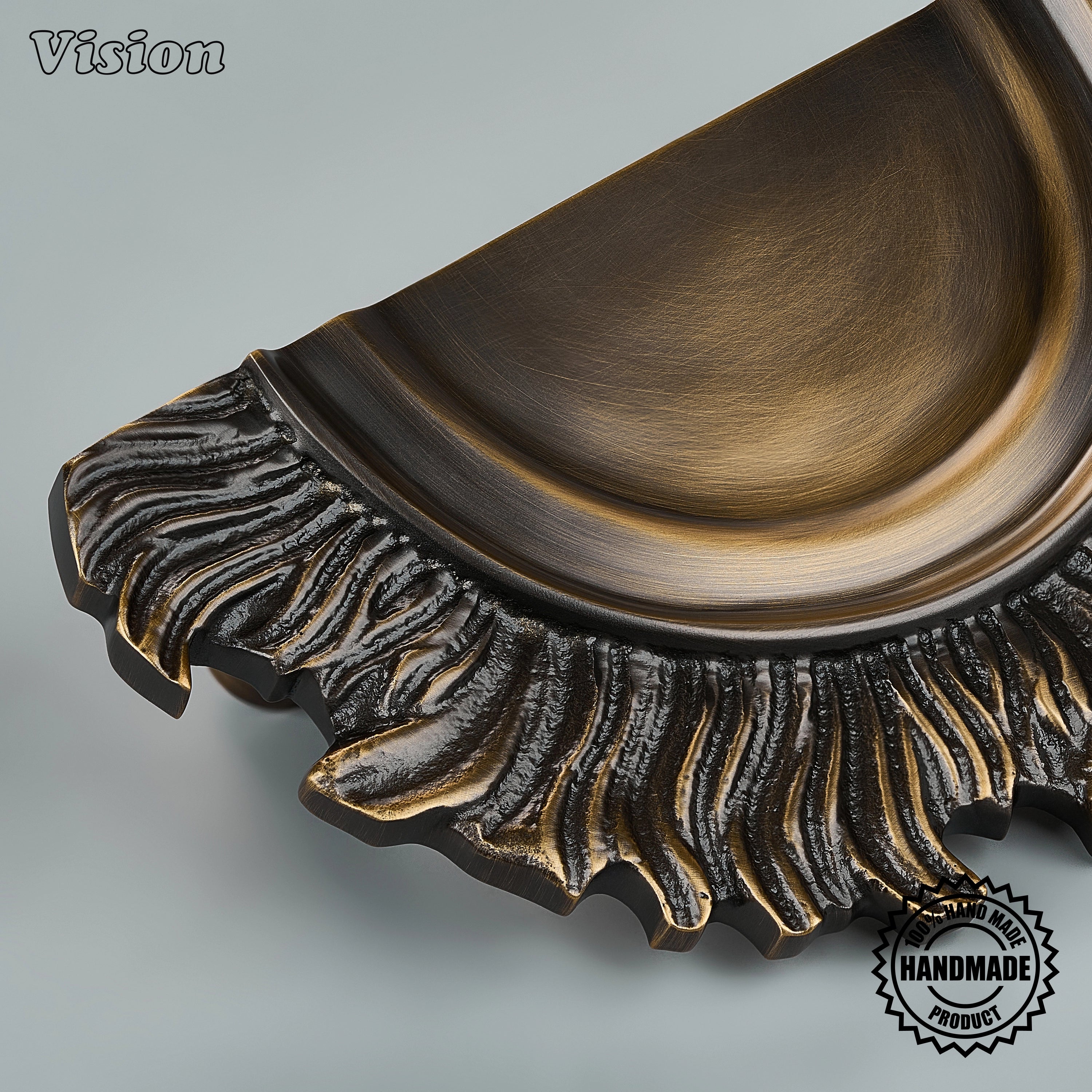 Premium Antique Bronze handcrafted sun-inspired door handle for pivot doors and architectural interiors.