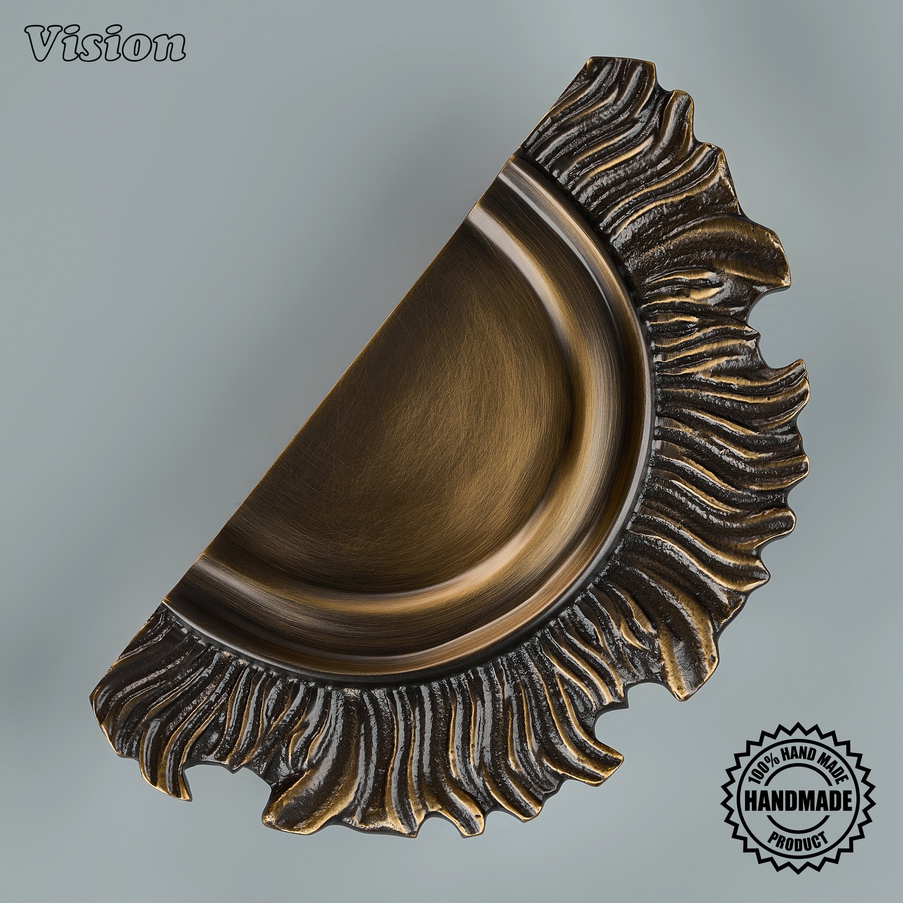 Antique Bronze handcrafted textured door handle with artistic sunburst detailing for luxury entrances.