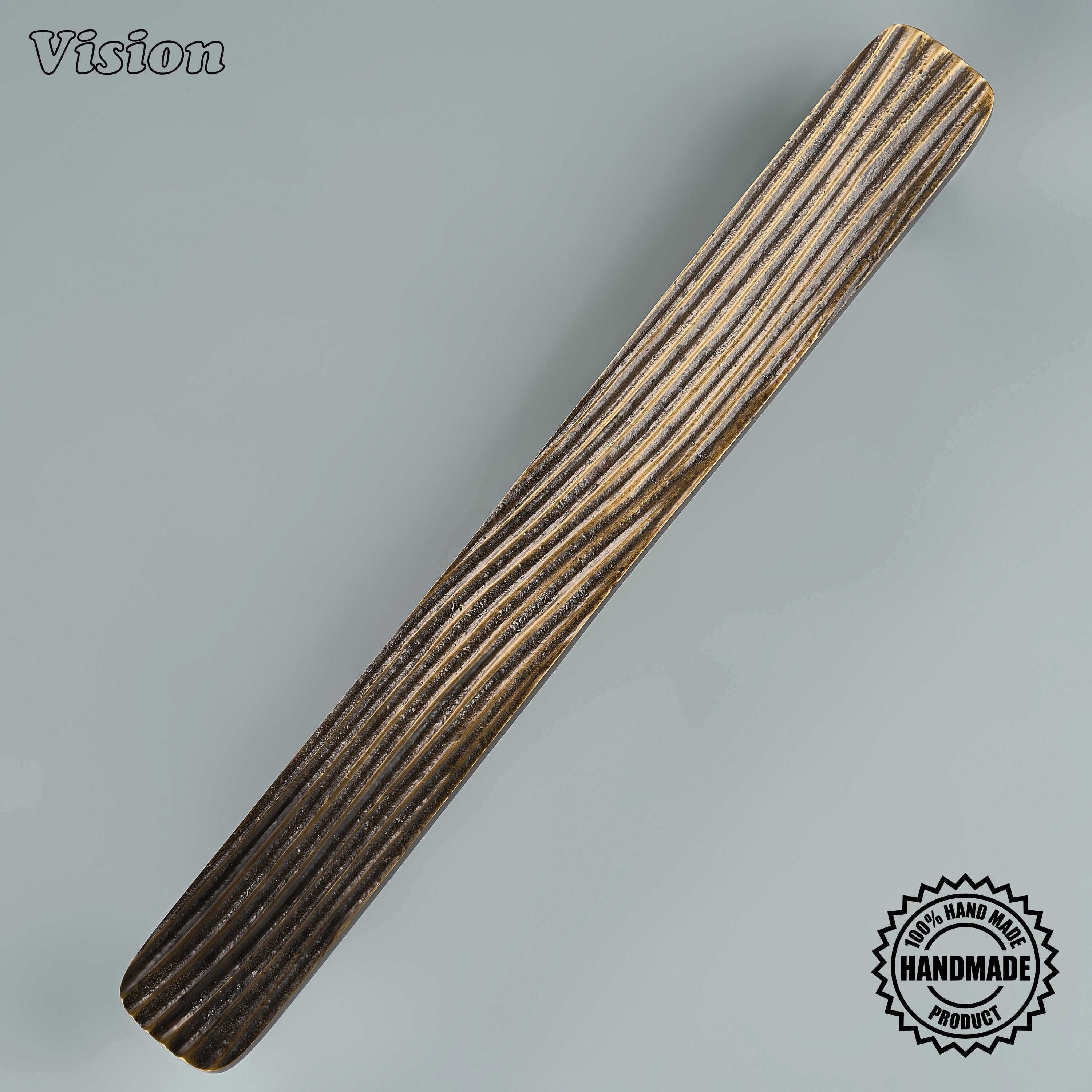 Antique bronze artisanal door handle with tactile layered surface for heavy interior doors