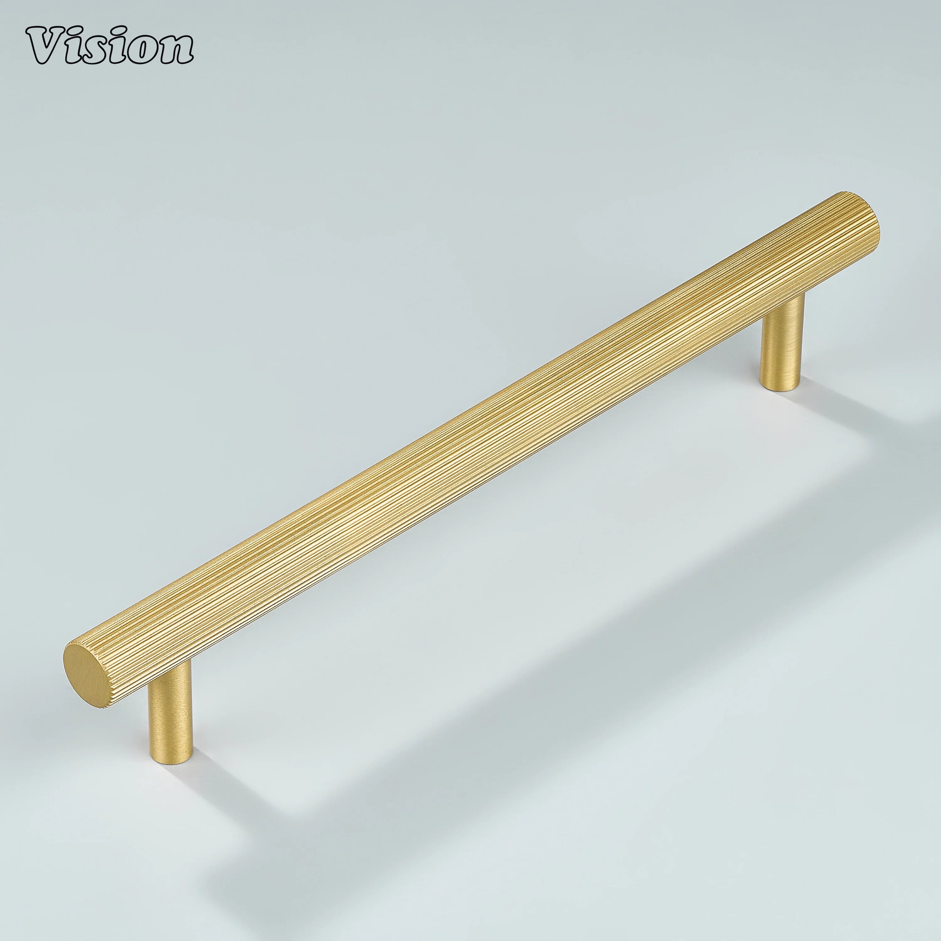Gold linear knurled brass handle offering strong grip on dresser drawers.