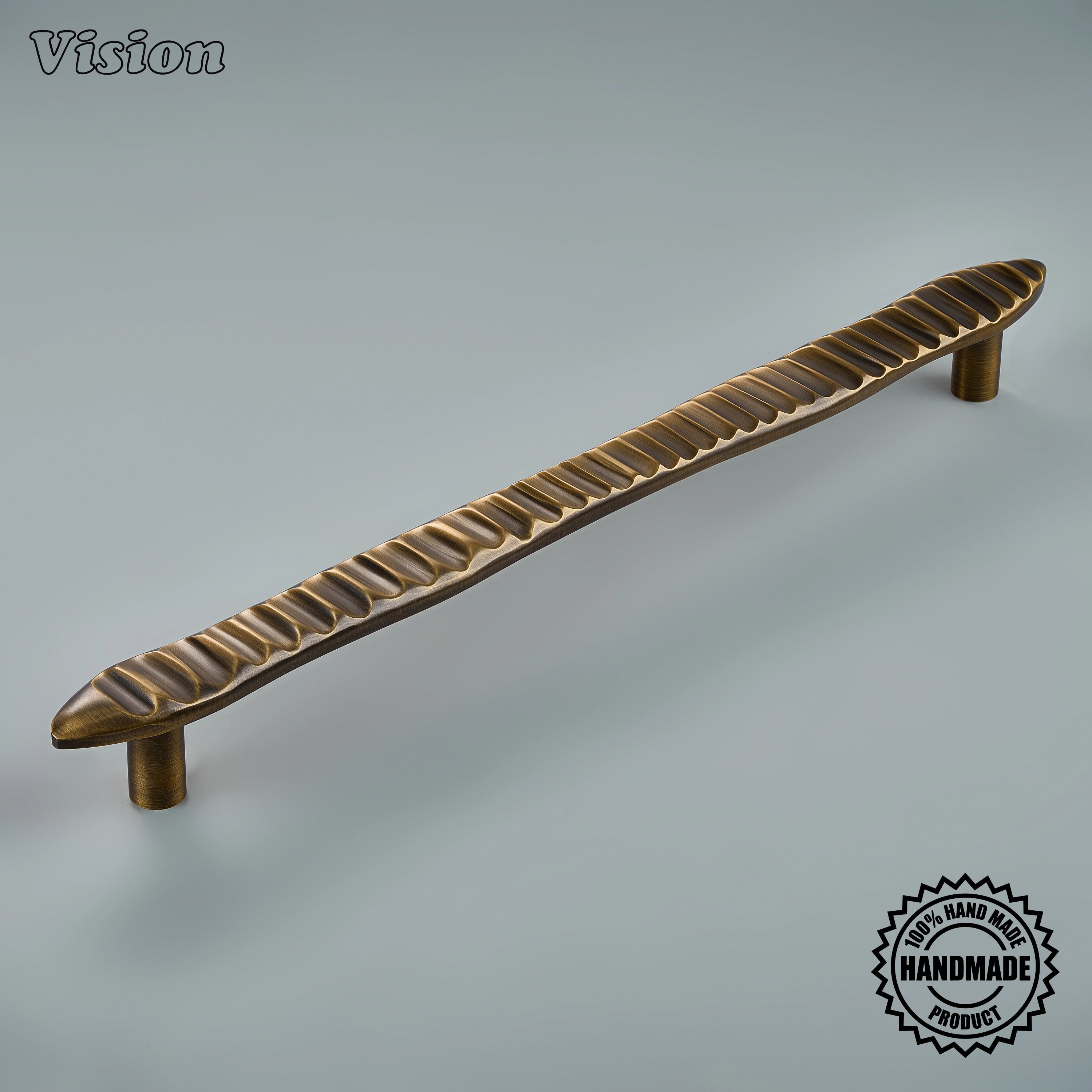 Antique Bronze handcrafted appliance pull with flowing wave profile for integrated refrigerator doors.