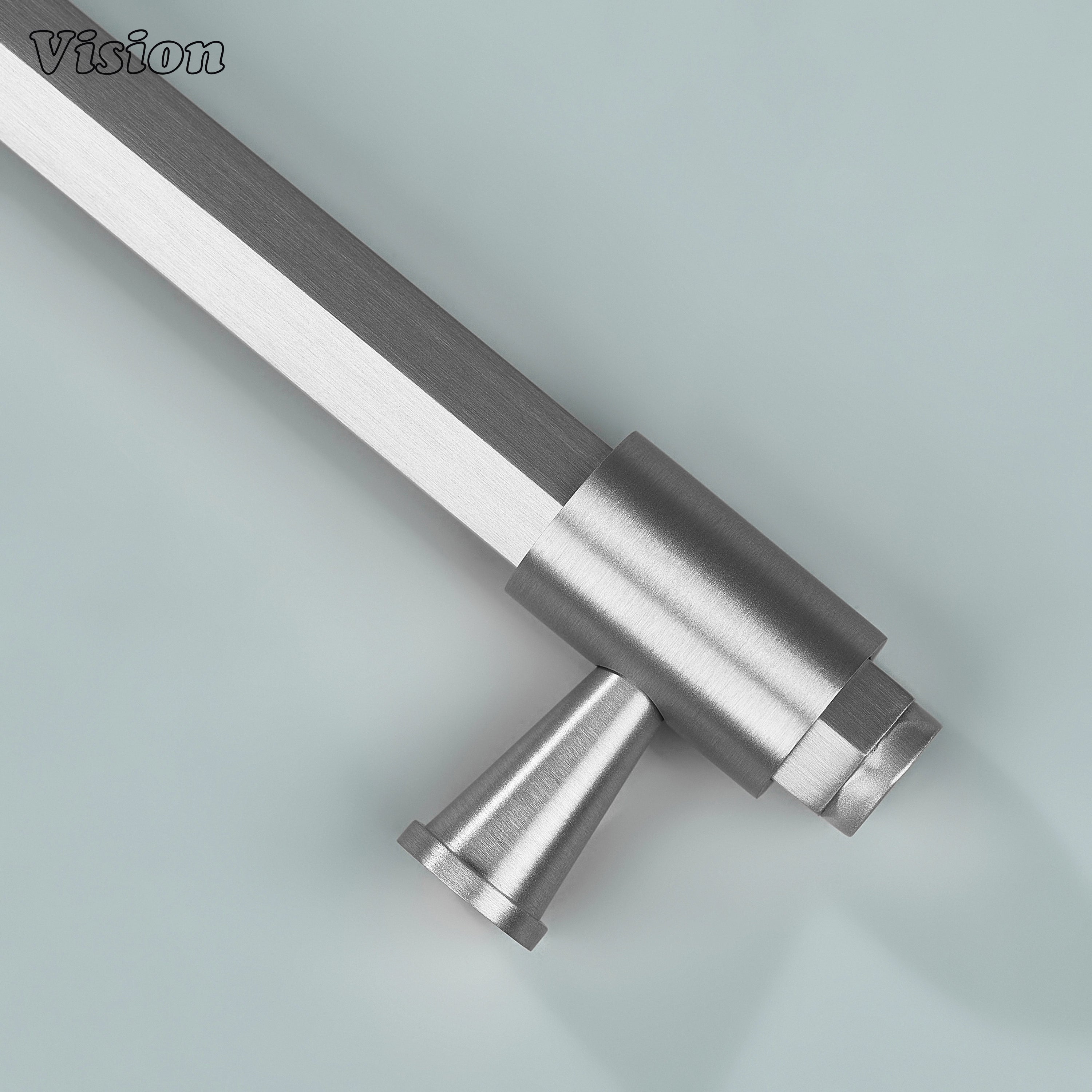 Silver cabinet handle with circular hardware ends and refined geometric styling for furniture