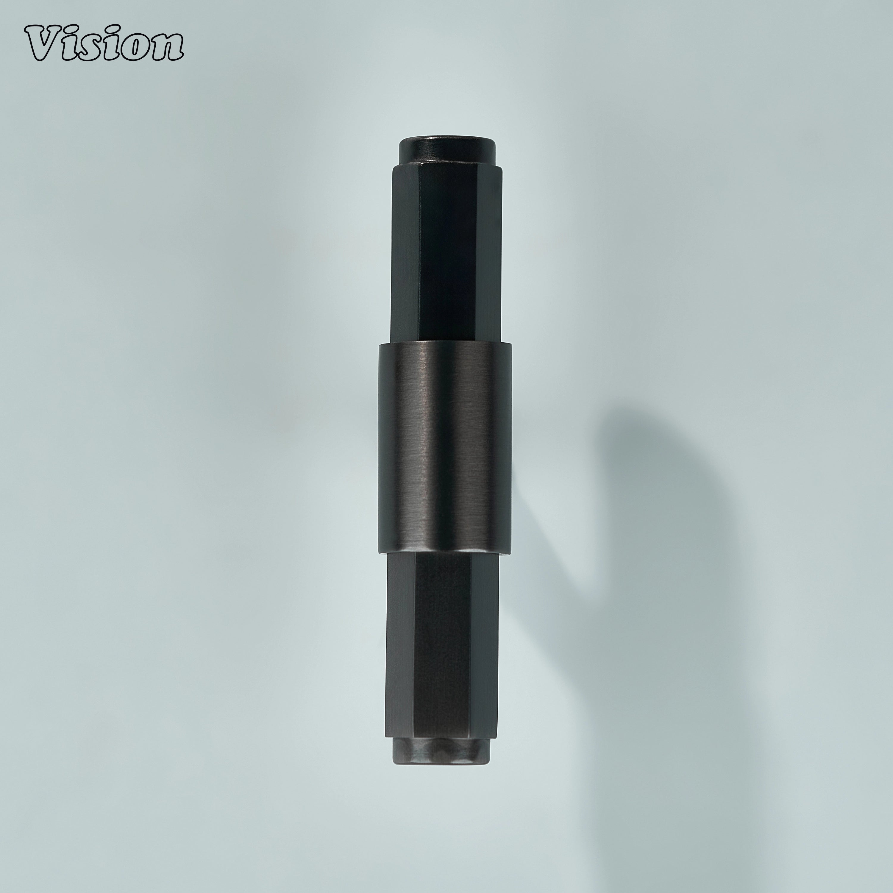 Gunmetal T-knob with circular mounting point and geometric styling for furniture cabinets