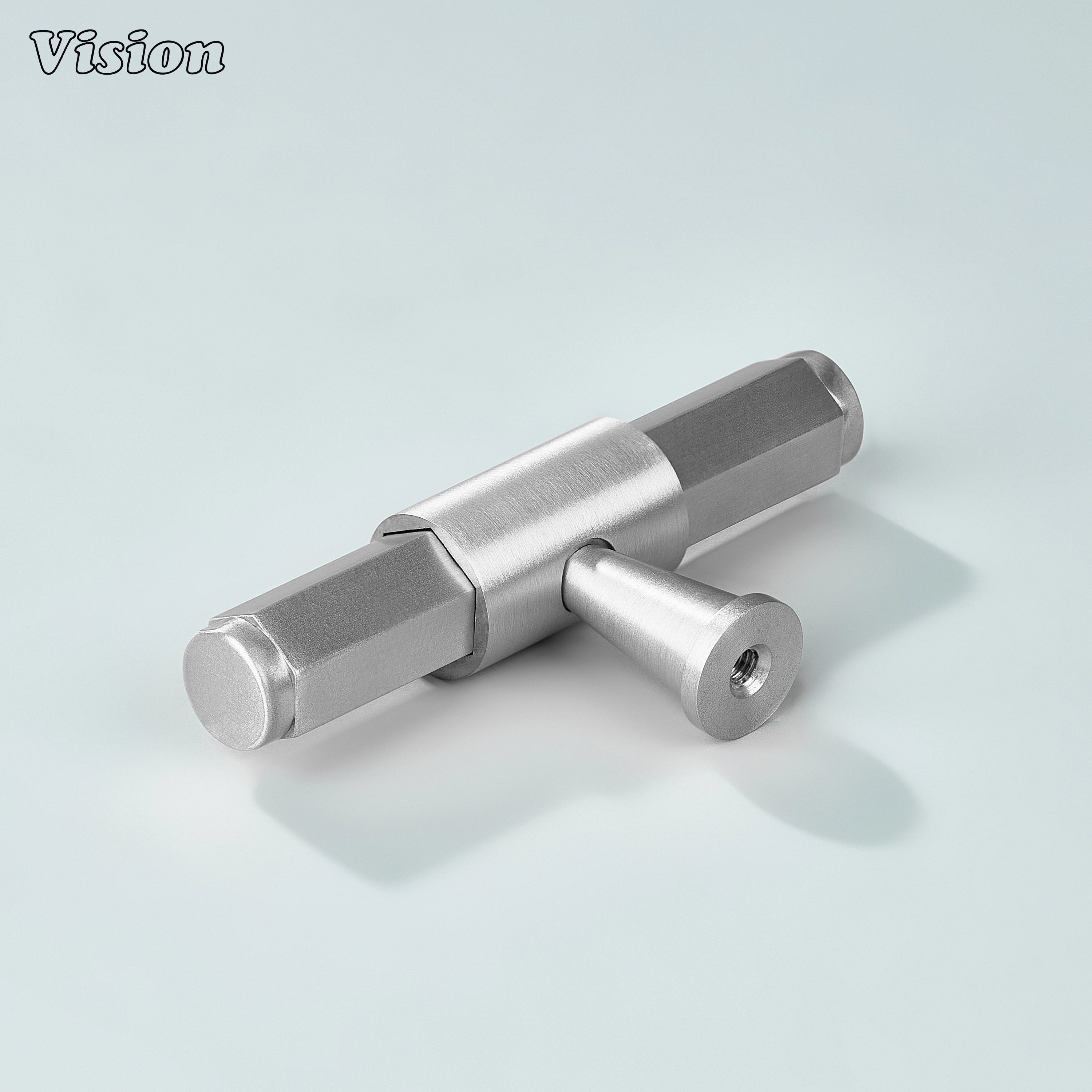Silver T-knob with geometric hexagonal profile and ring detailed base for furniture drawers