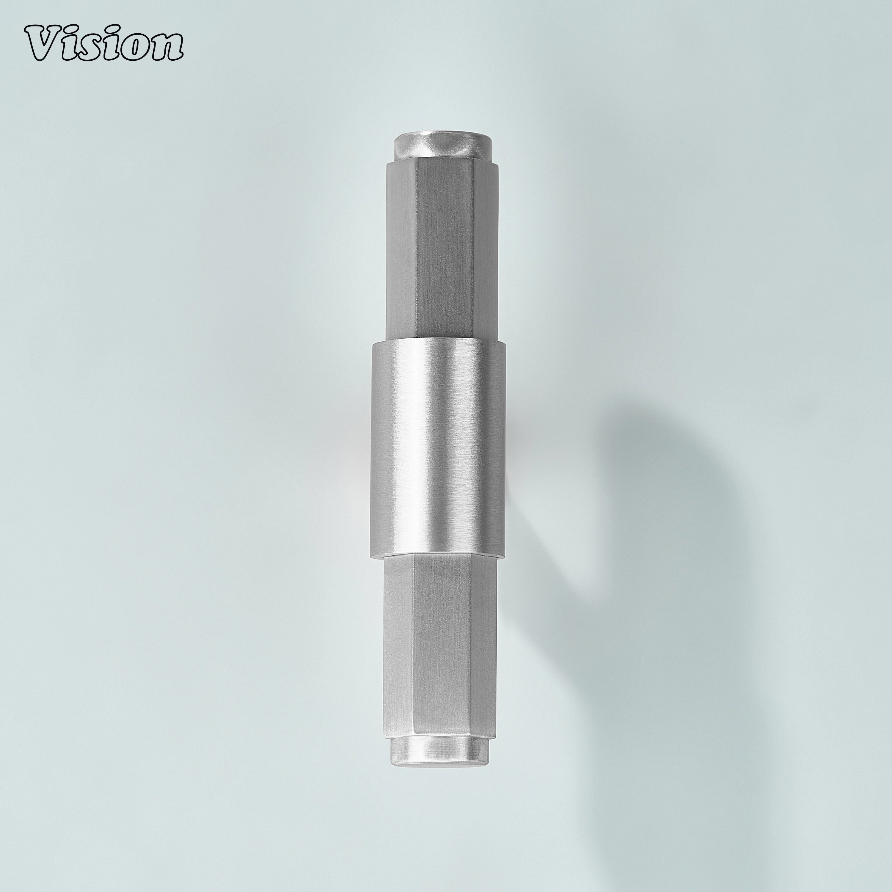 Silver T-knob with hexagonal profile and circular center detail for furniture cabinets