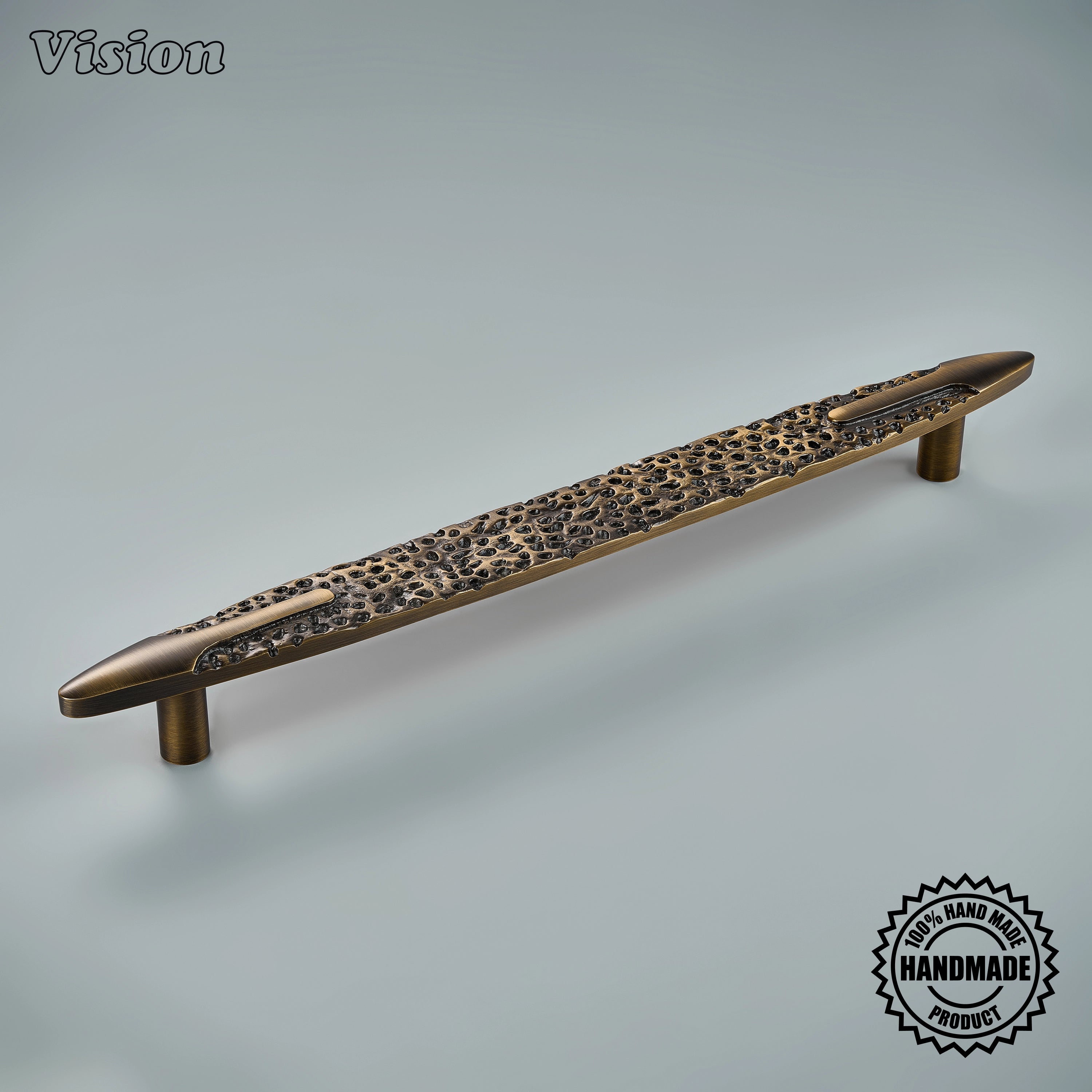 Antique Bronze handcrafted appliance pull with rugged textured solid brass surface and smooth end accents for luxury kitchen cabinets.