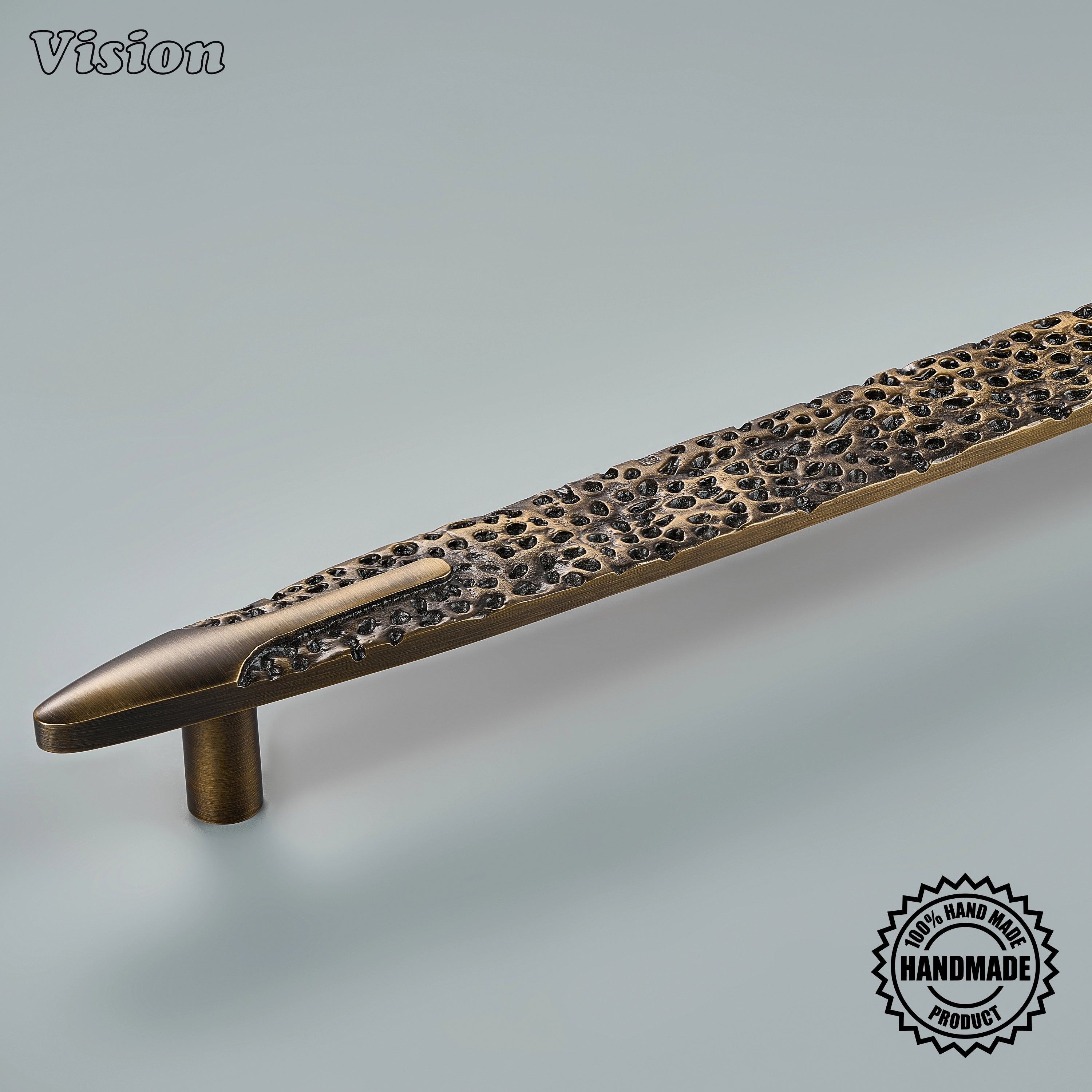 Antique Bronze cabinet handle featuring a nature-inspired textured profile with smooth grip sections for integrated refrigerator doors.