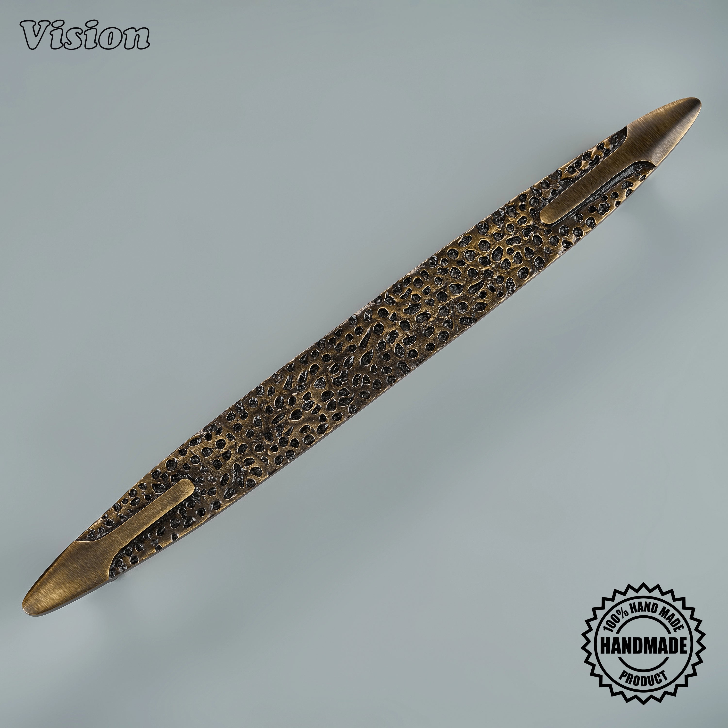 Antique Bronze handcrafted appliance handle with sculpted smooth accents and textured brass body for built-in appliances.
