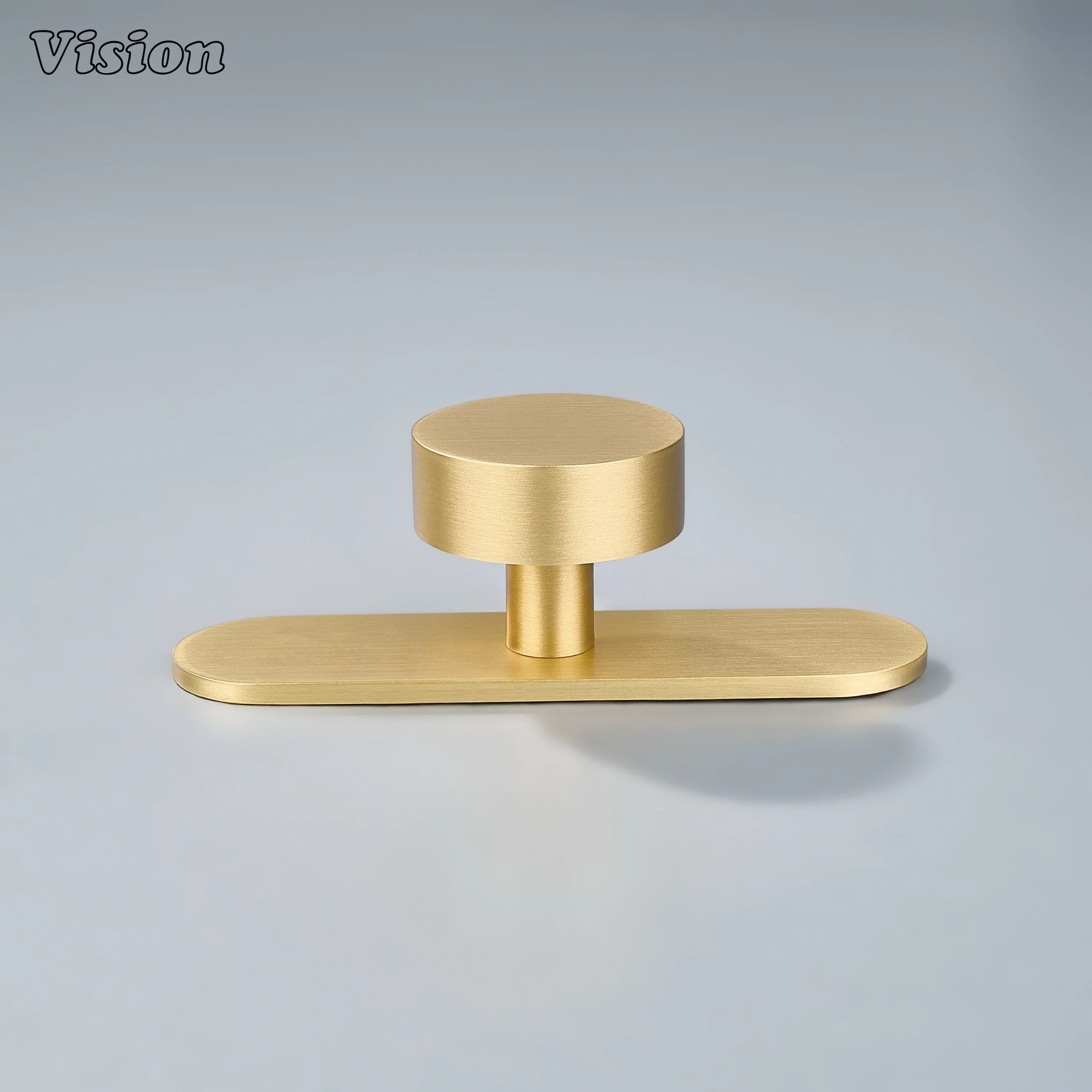 Gold cabinet knob featuring smooth round design with backplate for modern wardrobe doors