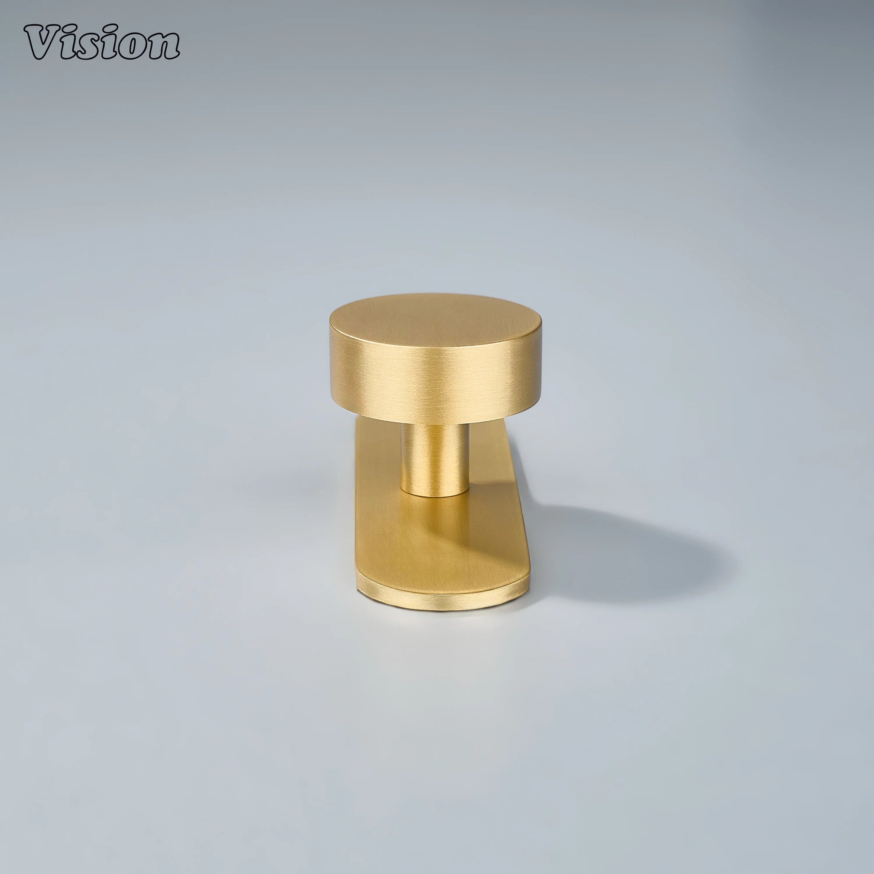 Premium Gold cabinet knob with round form and backplate used on furniture units
