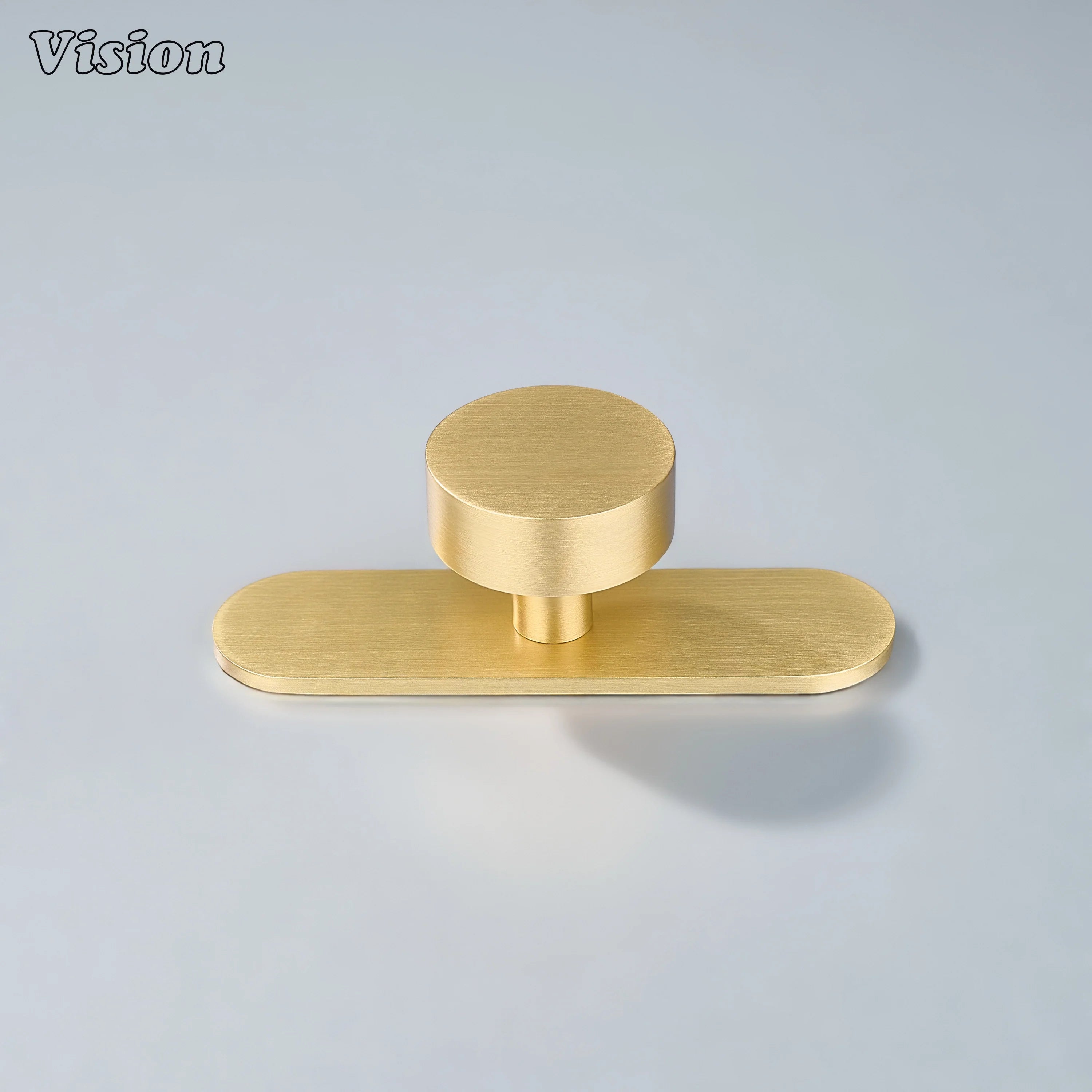 Gold finish cabinet knob with clean round shape and backplate for wardrobe drawers