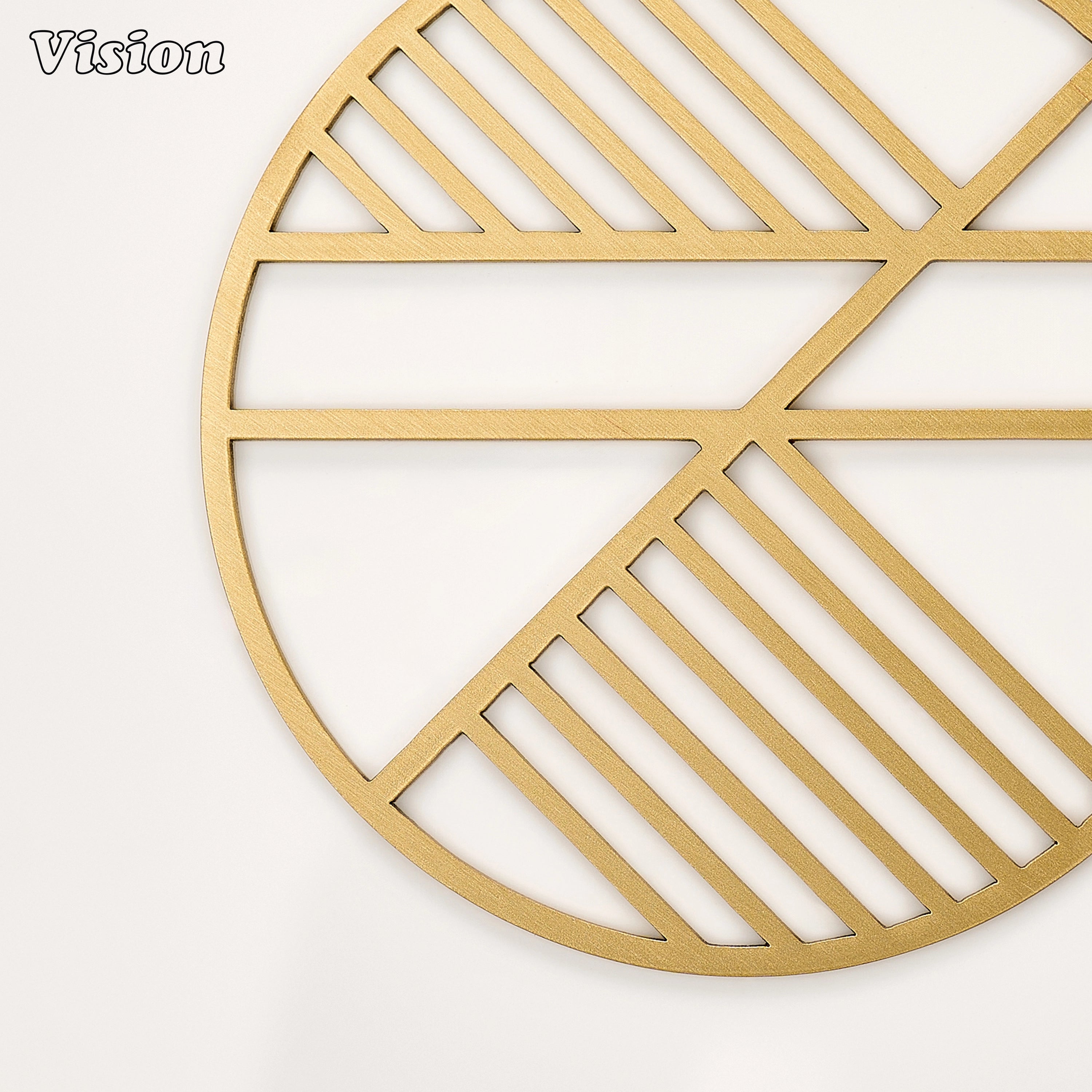 Sleek gold solid brass drink coaster with dynamic geometric patterns on a contemporary home office desk
