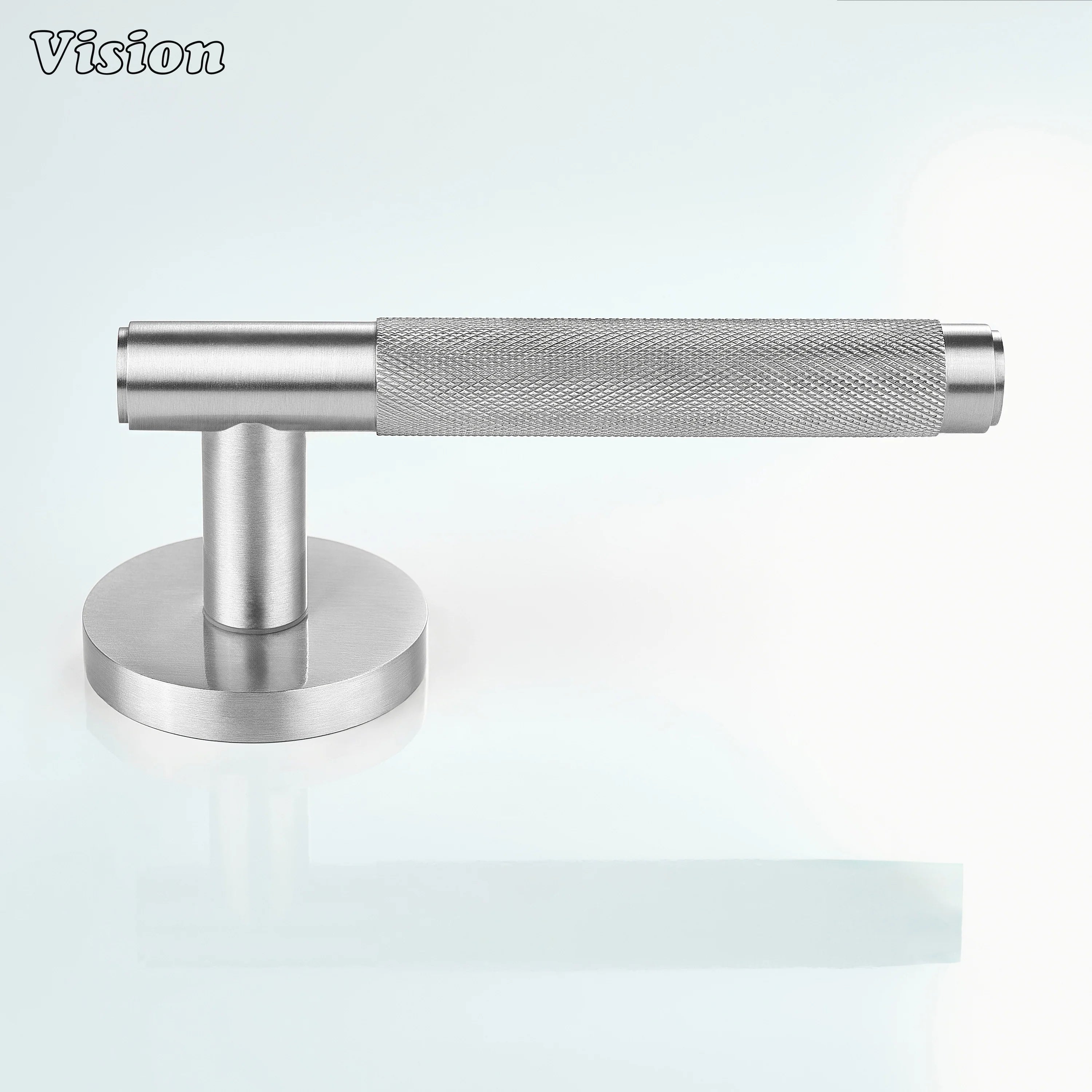 Silver knurled door handle installed on a modern bedroom door.